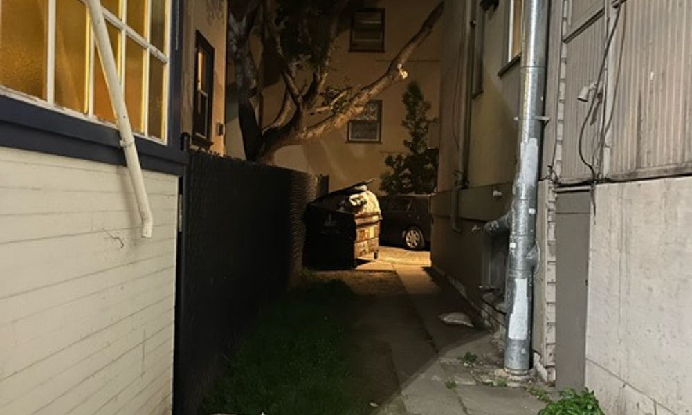 Dark alleyway with trash