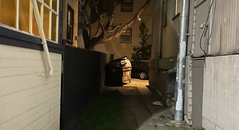 Dark alleyway with trash