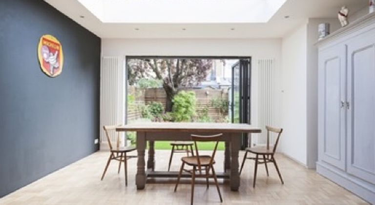 Contemporary Edwardian terrace in urban Tooting Bec, open plan, flexible space, moveable island and furniture, bifolders